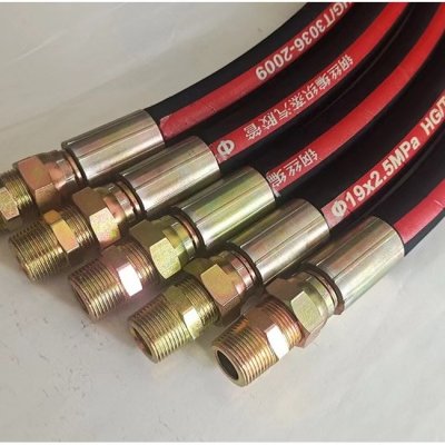 Steam hose with boss couplings & aluminum clamps
